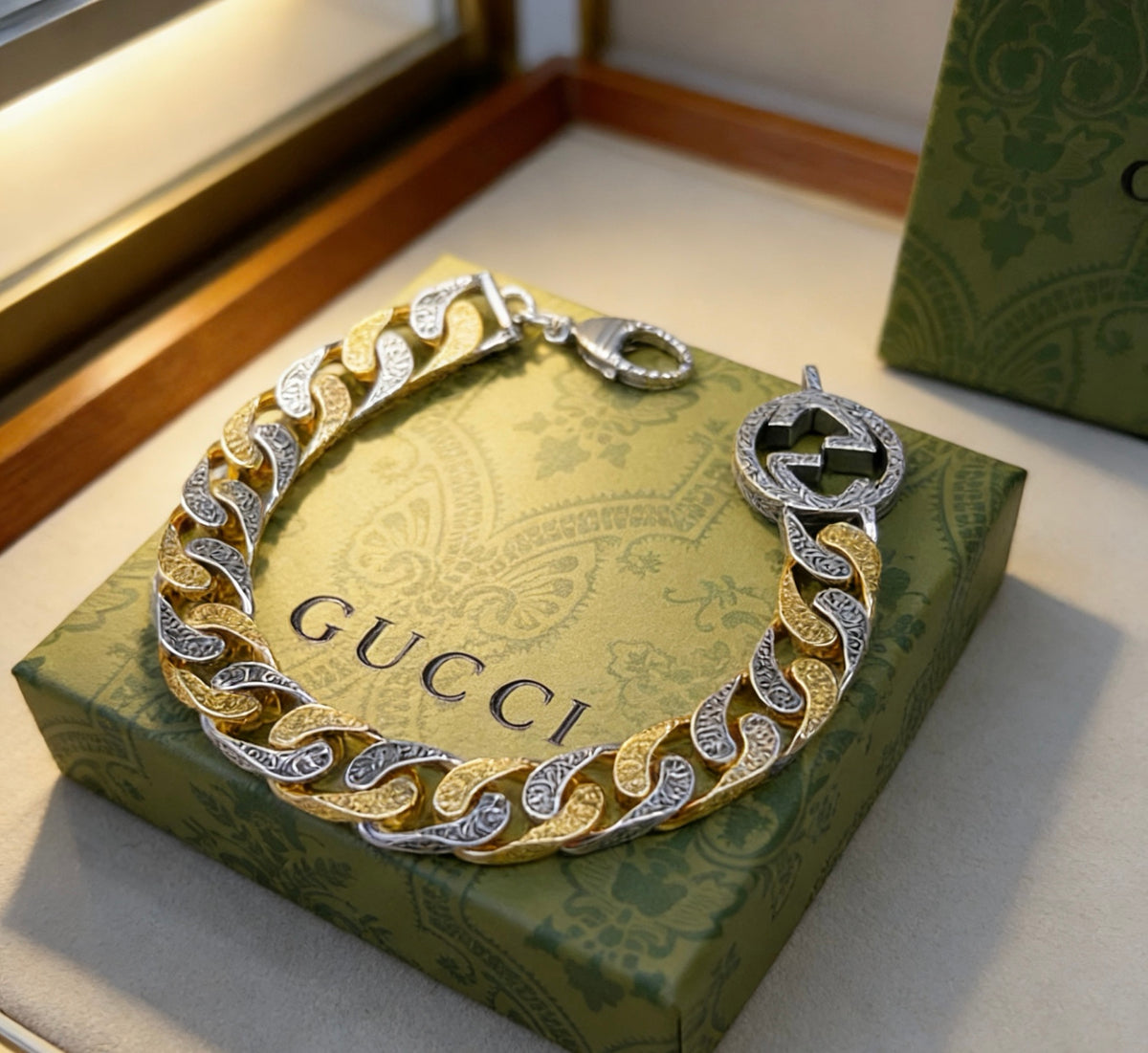 Gucci gold and silver bracelet